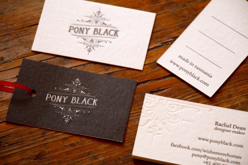 Business cards and swing tags designed for Pony Black by Brave Agency
